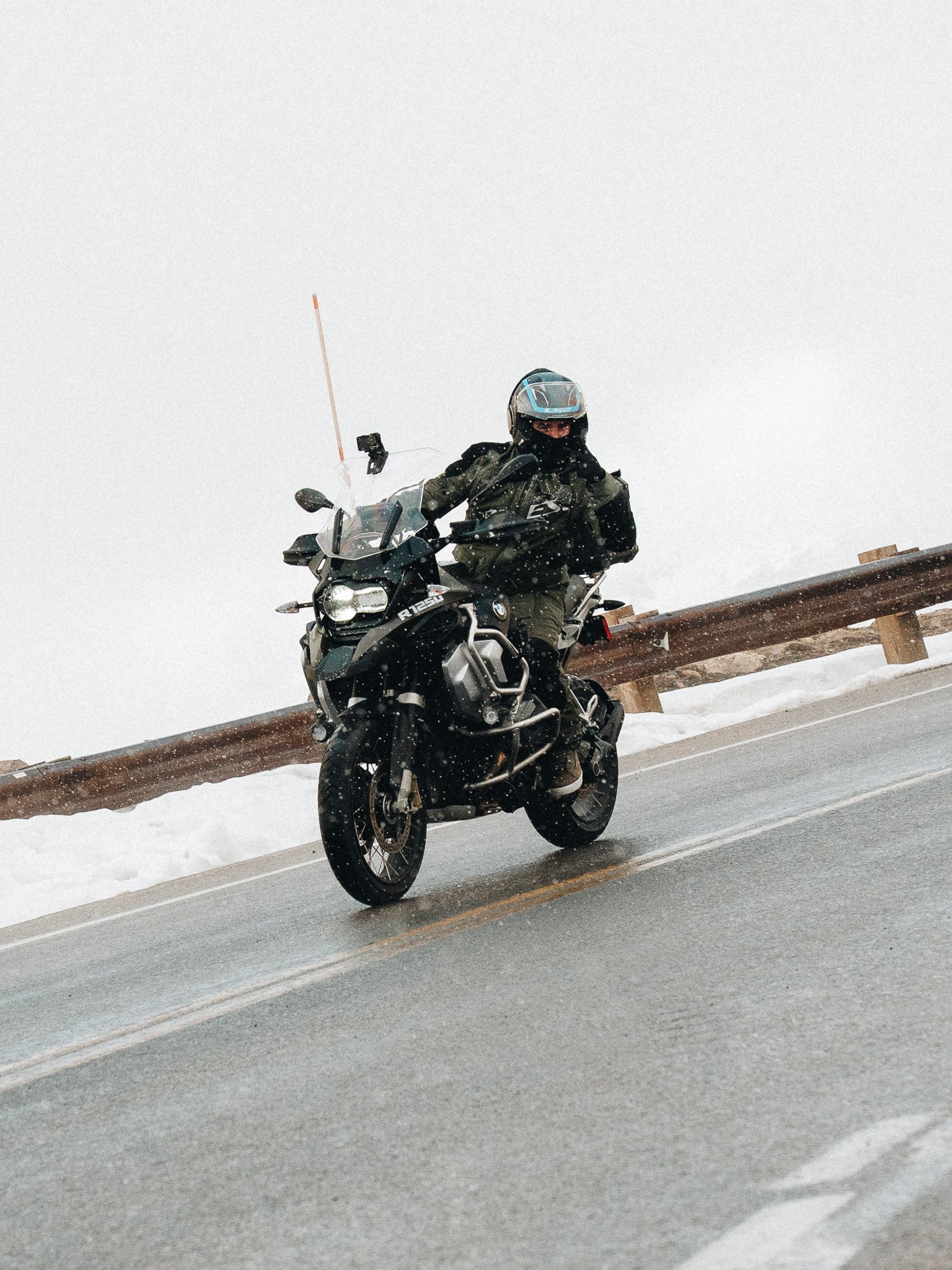 Rider on a snowy mountain pass