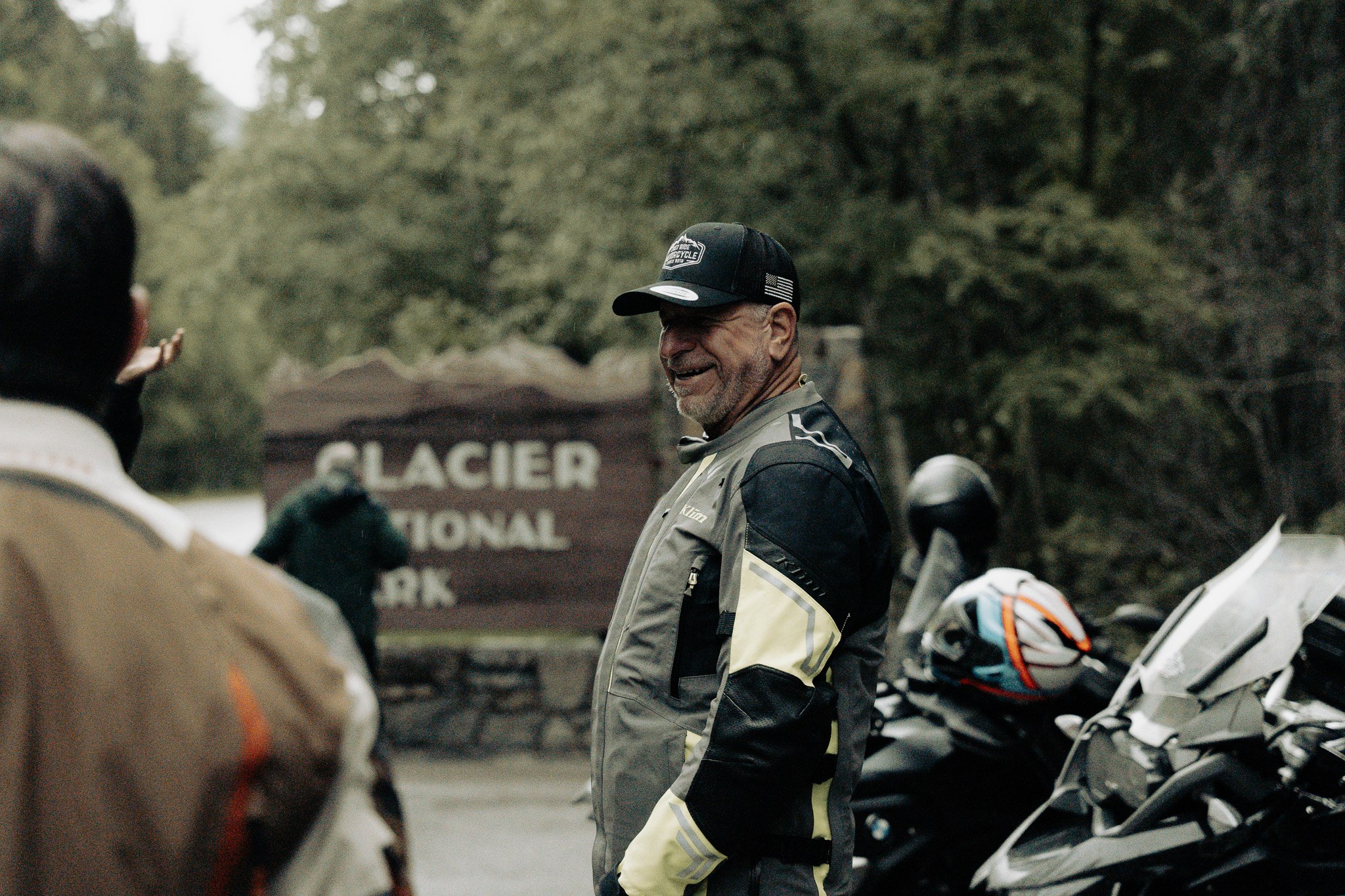 Rider at the Glacier National Park entrance sign